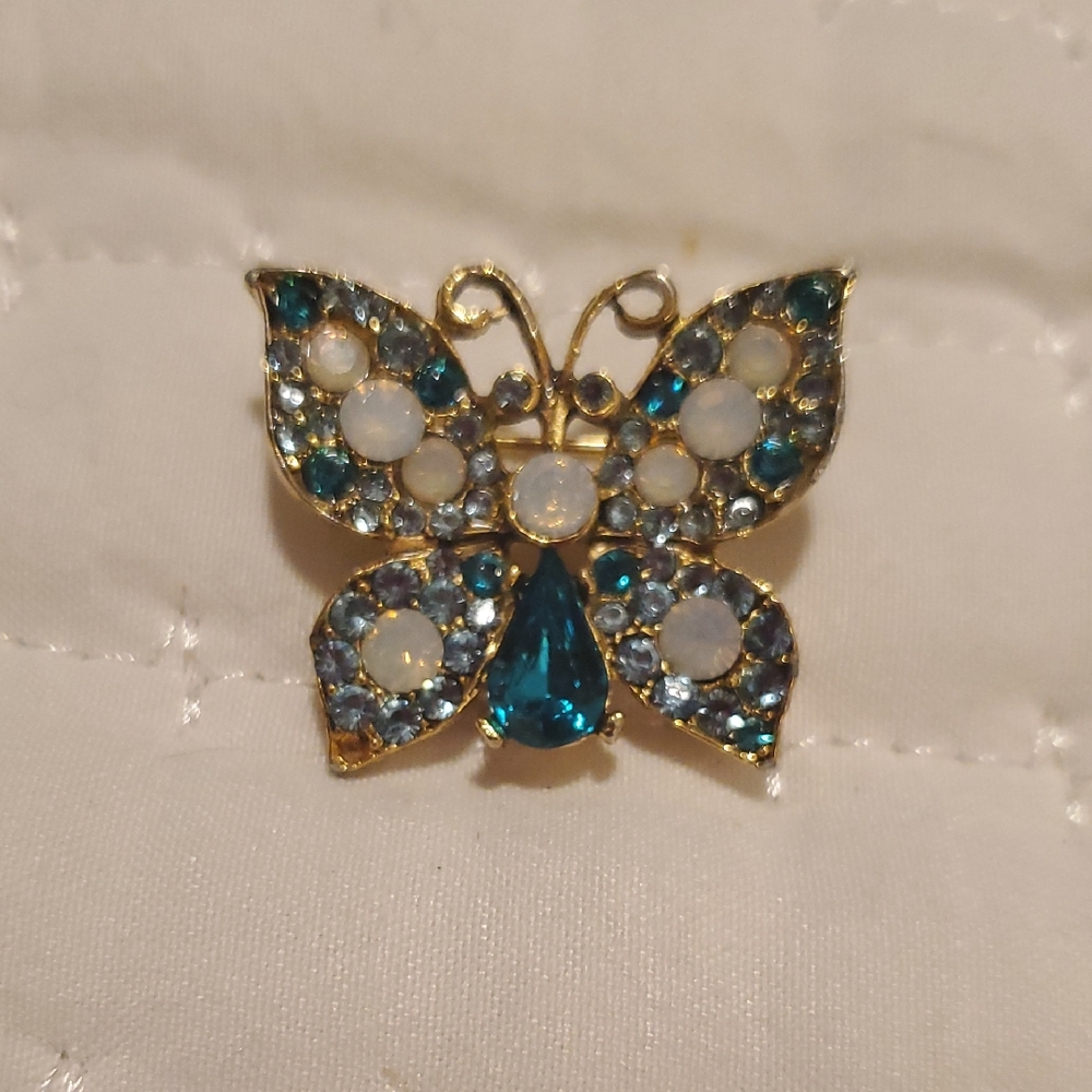 Dazzling Butterfly Brooch with Teal and Gold Hues